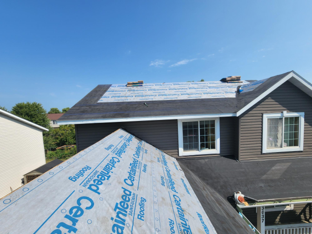 Shakopee, MN roof being repaired by Iron River Construction
