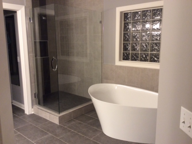 BATHROOM REMODELING Bathroom remodeling projects completed by Iron River Construction